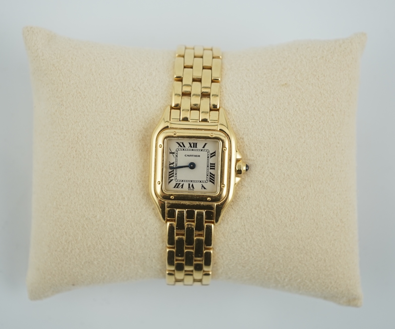 A lady's 18ct gold Cartier Panthere quartz wrist watch